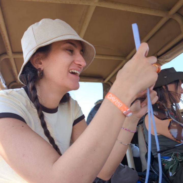 Safari jeep on the Serengeti plains with Ear Dell'Africa